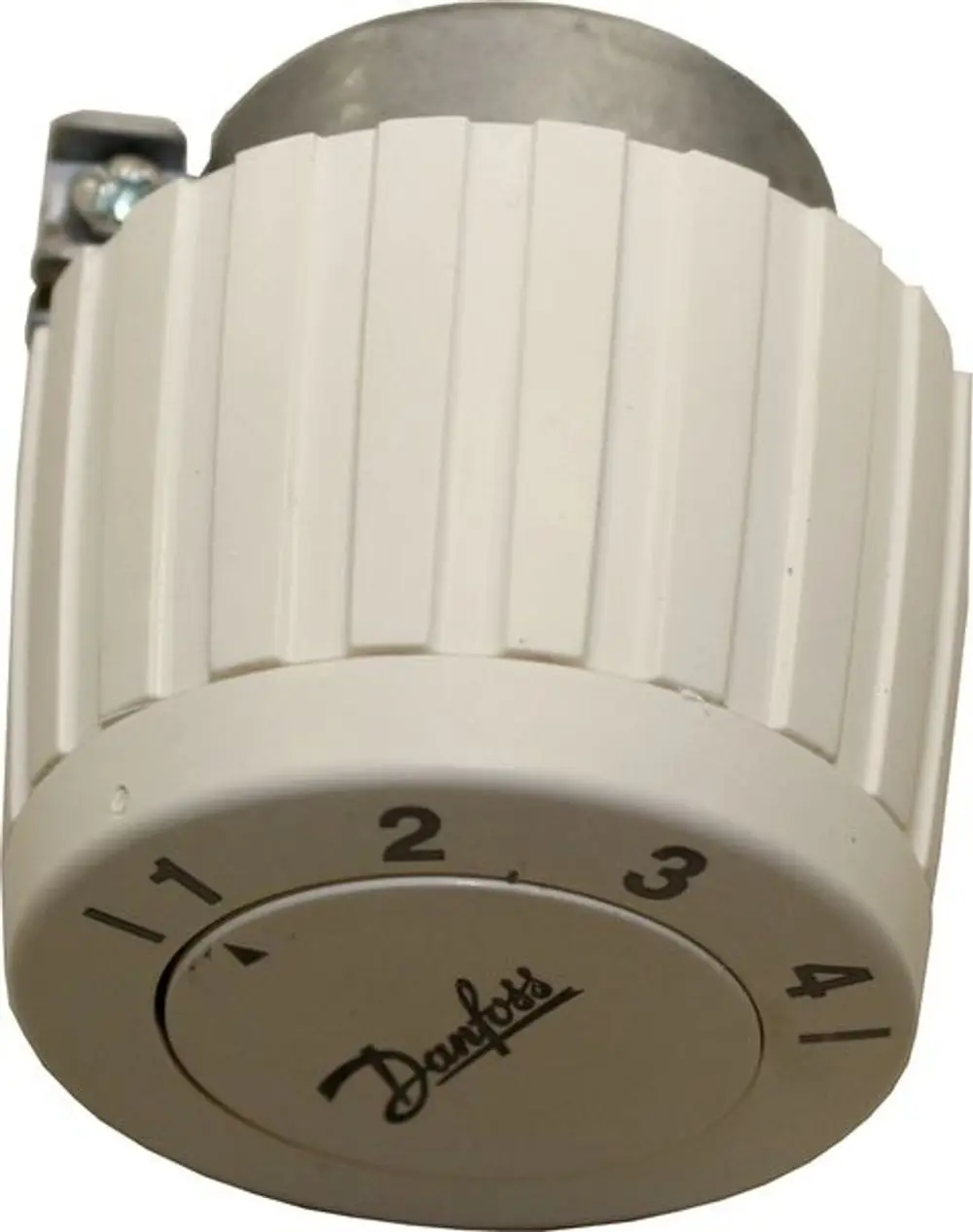 Weißes Thermostat mit gerilltem Design und Zahlenmarkierungen von Wolf. Das Gerät zeigt einen Drehknopf zur Temperatureinstellung.